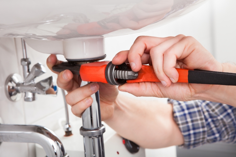 Emergency plumber attending a job in West Watford